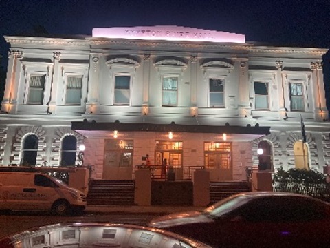 Image of Kyneton Town Hall at night in 2022 after new facade works