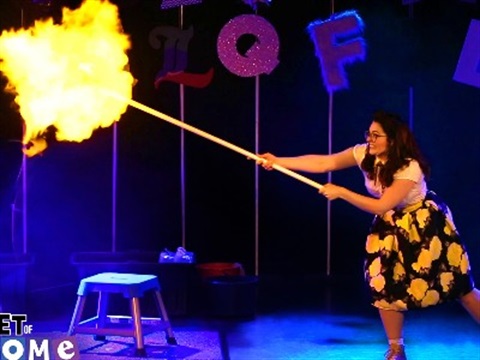 On stage image of science experiment with fire