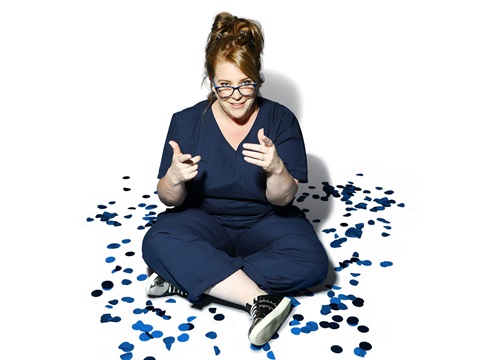 Image of comedian Georgie Carrroll as Sista in nurses uniform