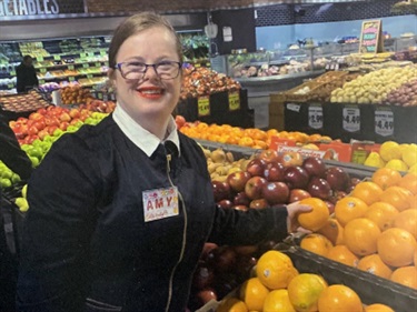 Education and employment and Overall winner – Natalie Hayes with her photo of Amy at work experience.