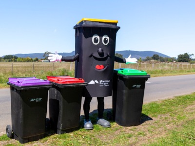 Kerby-bin-mascot-with-bins